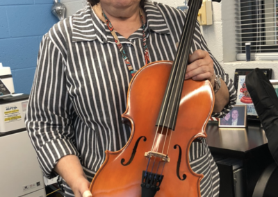 Ms. Schuster with the 1/10 size Cello